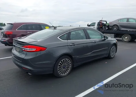 2018 Ford Fusion Hybrid Titanium z USA, uszkodzony, nr VIN 3FA6P0RUXJR124344